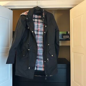 Women’s Hooded rain jacket.